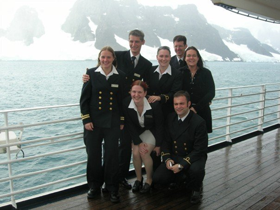 Emily with fellow crew members on board a ship