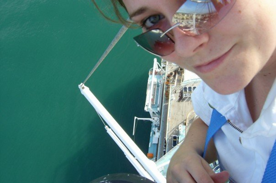 A selfie taken by Emily as she is on the mast of a ship | Career at Sea
