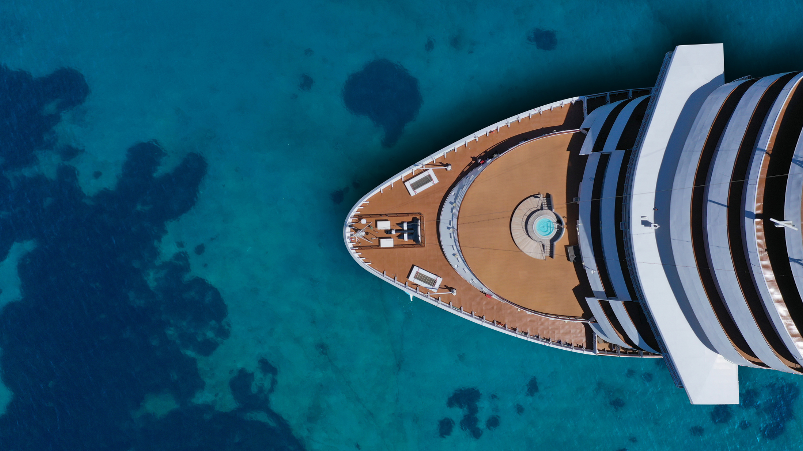 Image of a cruise ship at sea from an aerial perspective
